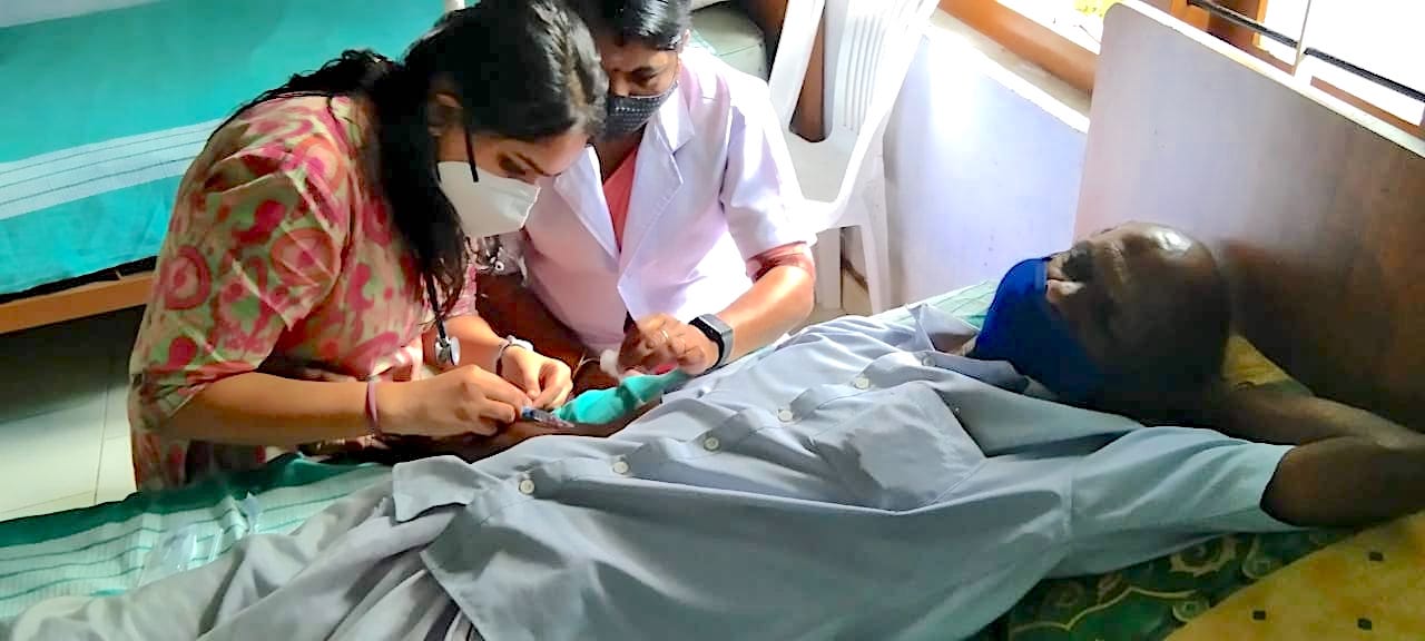 Young Doctor Amongst Her Patients of Wayanad